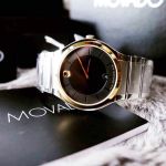 Movado Quadro Mặt Tròn Màu Đen Viền Vàng Dây Kim Loại Lịch Ngày 0606954