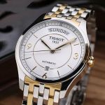 Tissot T-One Automatic Mặt Tròn Dây Kim Loại Màu Bạc Pha Vàng Lịch Ngày Thứ T038.430.22.037.00