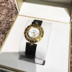 Versace Eon Mặt Tròn Xoay Viền Vàng Dây Da Màu Đen V79020014