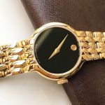 Movado Veturi Mặt Tròn Màu Đen Dây Kim Loại Màu Vàng 0606935