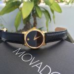 Movado Museum Mặt Tròn Viền Vàng Dây Da Màu Đen 2100006