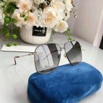 Gucci Grey Metal Mắt Xám Gọng Đen Vàng GG0394S