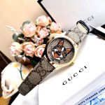 Gucci G-Timeless Mặt Tròn Viền Vàng Dây Da Màu Nâu YA1264057