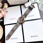 Gucci G-Timeless Mặt Tròn Viền Vàng Dây Da Màu Nâu YA1264057